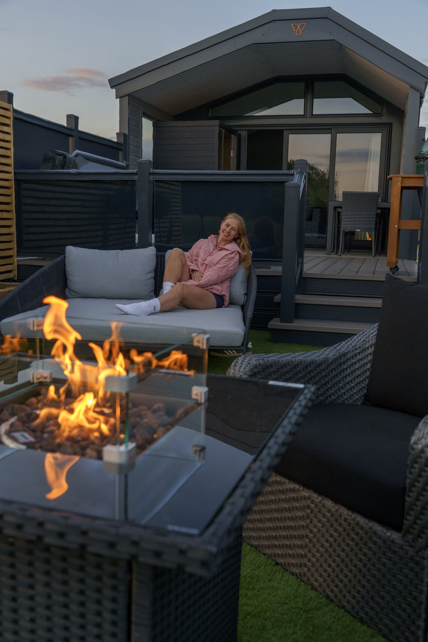relaxing by a fire pit