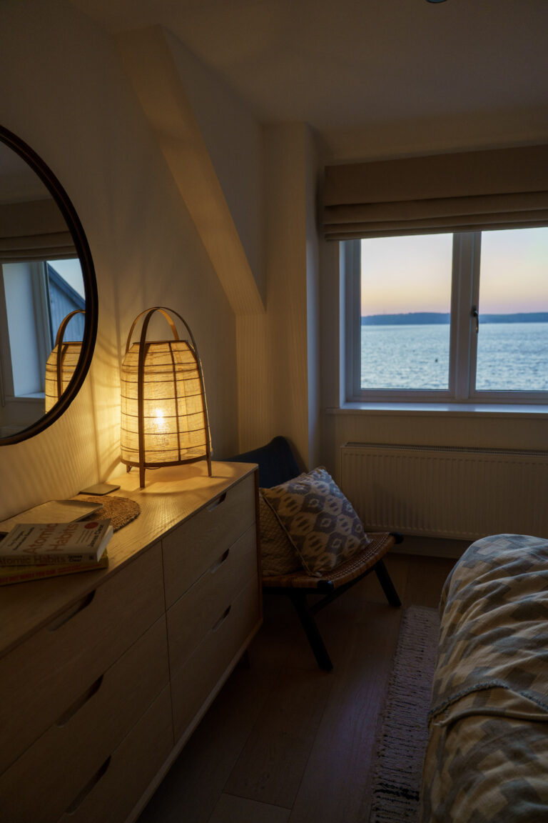 Bedroom views out to a sunrise over the sea
